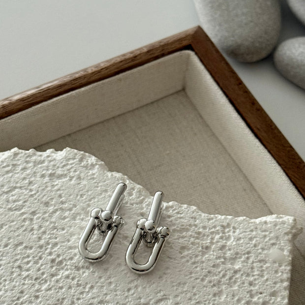 Tiffany Model Gümüş Renk Çelik Zincir Geçmeli Küpe